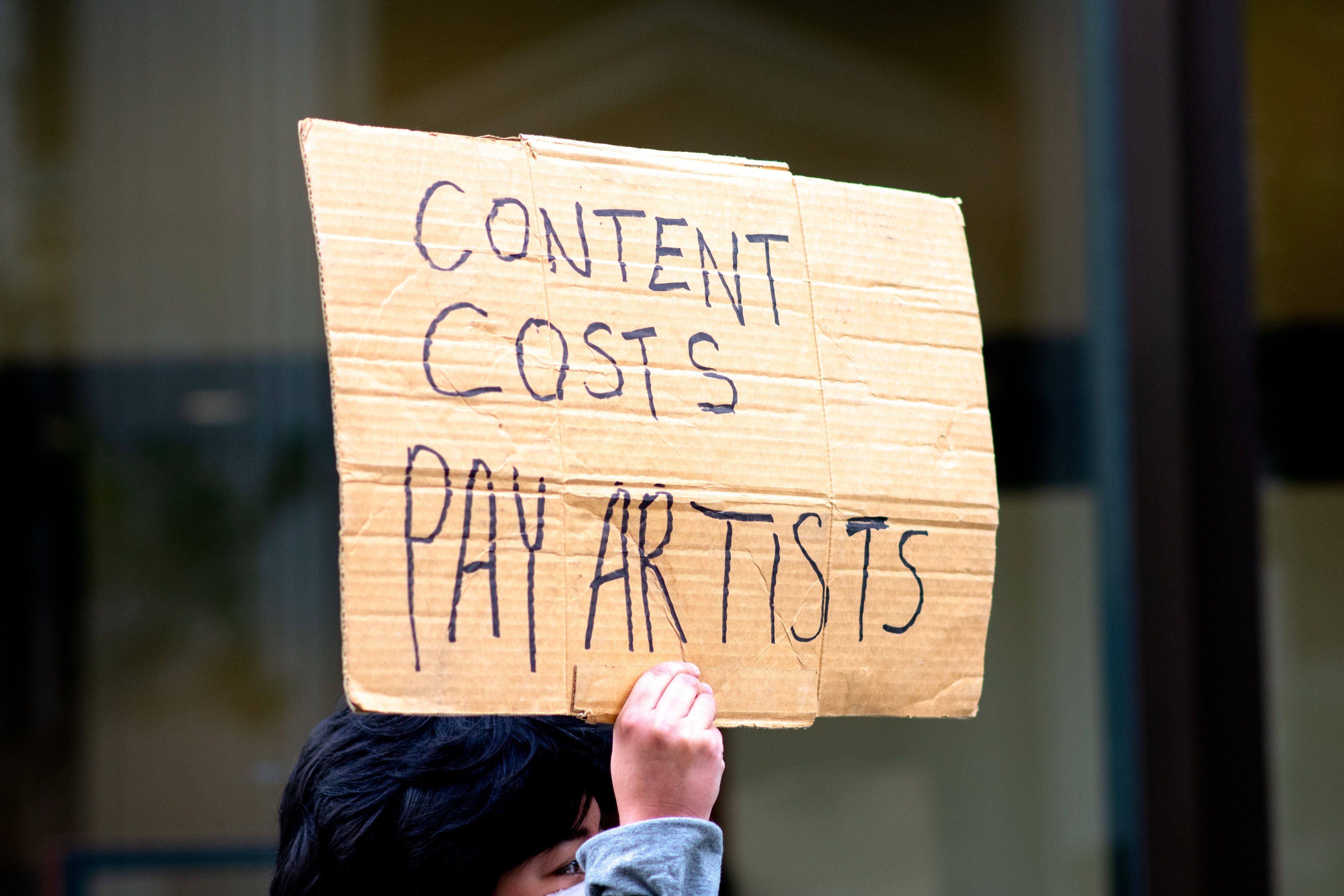 patrick-perkins-C07TpEdjD44-unsplash.jpeg content costs pay artists